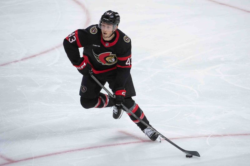Oct 19, 2024; Ottawa, Ontario, CAN; Ottawa Senators defenseman Tyler Kleven (43) skates with the puck in the third period against the Tampa Bay Lightning at the Canadian Tire Centre. Mandatory Credit: Marc DesRosiers-Imagn Images