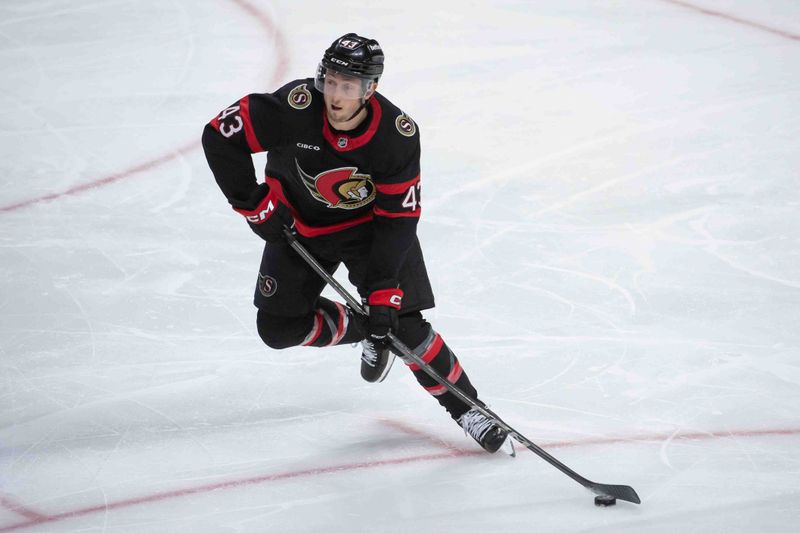 Oct 19, 2024; Ottawa, Ontario, CAN; Ottawa Senators defenseman Tyler Kleven (43) skates with the puck in the third period against the Tampa Bay Lightning at the Canadian Tire Centre. Mandatory Credit: Marc DesRosiers-Imagn Images