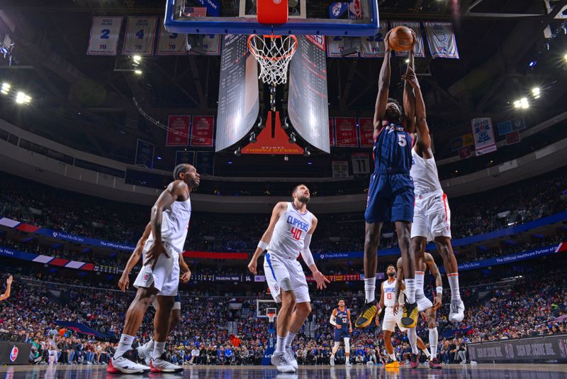 PHILADELPHIA, PA - MARCH 27: Mo Bamba #5 of the Philadelphia 76ers rebounds the ball during the game against the LA Clippers on March 27, 2024 at the Wells Fargo Center in Philadelphia, Pennsylvania NOTE TO USER: User expressly acknowledges and agrees that, by downloading and/or using this Photograph, user is consenting to the terms and conditions of the Getty Images License Agreement. Mandatory Copyright Notice: Copyright 2024 NBAE (Photo by Jesse D. Garrabrant/NBAE via Getty Images)