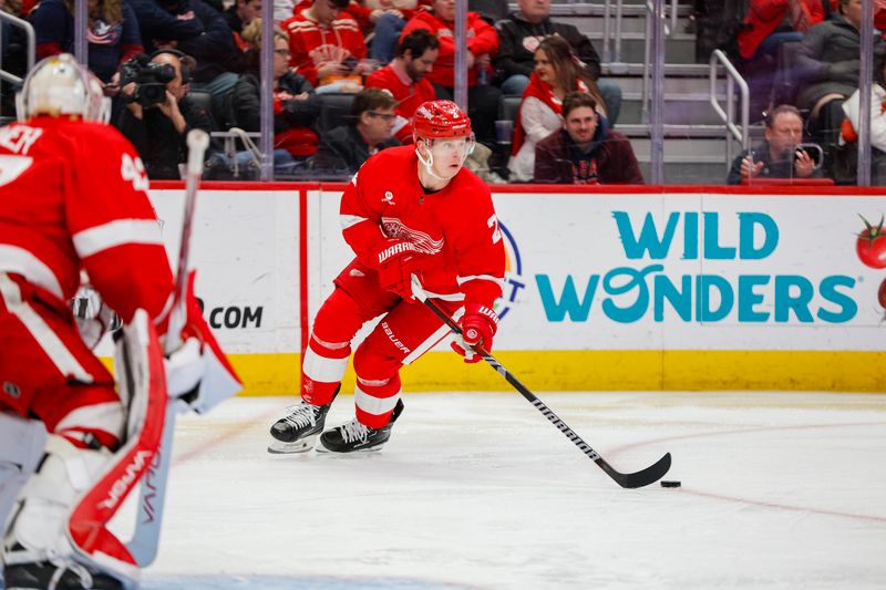 Mar 19, 2024; Detroit, Michigan, USA; Detroit Red Wings defenseman Olli Maatta (2) handles the puck during the third period of the game against the Columbus Blue Jackets at Little Caesars Arena. Mandatory Credit: Brian Bradshaw Sevald-USA TODAY Sports