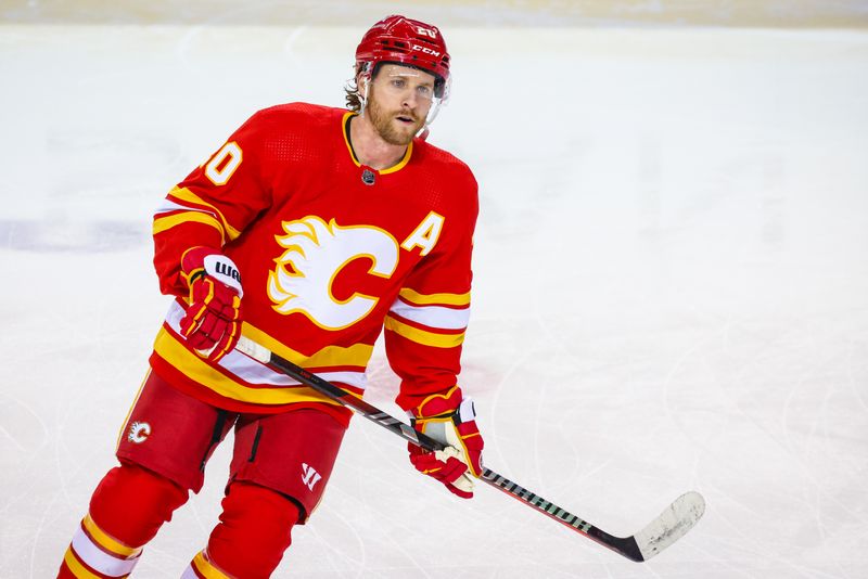 Apr 18, 2024; Calgary, Alberta, CAN; Calgary Flames center Blake Coleman (20) skates during the warmup period against the San Jose Sharks at Scotiabank Saddledome. Mandatory Credit: Sergei Belski-USA TODAY Sports