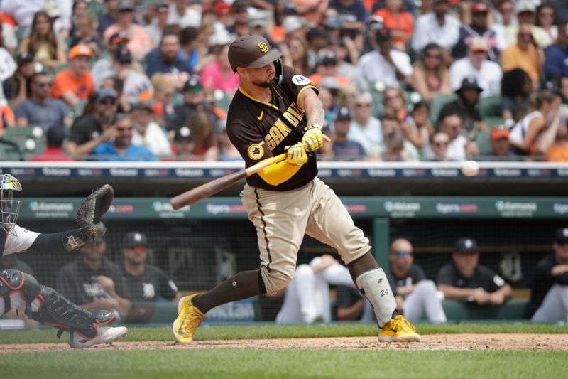 Jul 23, 2023; Detroit, Michigan, USA; San Diego Padres catcher Gary S  nchez (99) hits a home run during the seventh inning at Comerica Park. Mandatory Credit: Brian Bradshaw Sevald-USA TODAY Sports