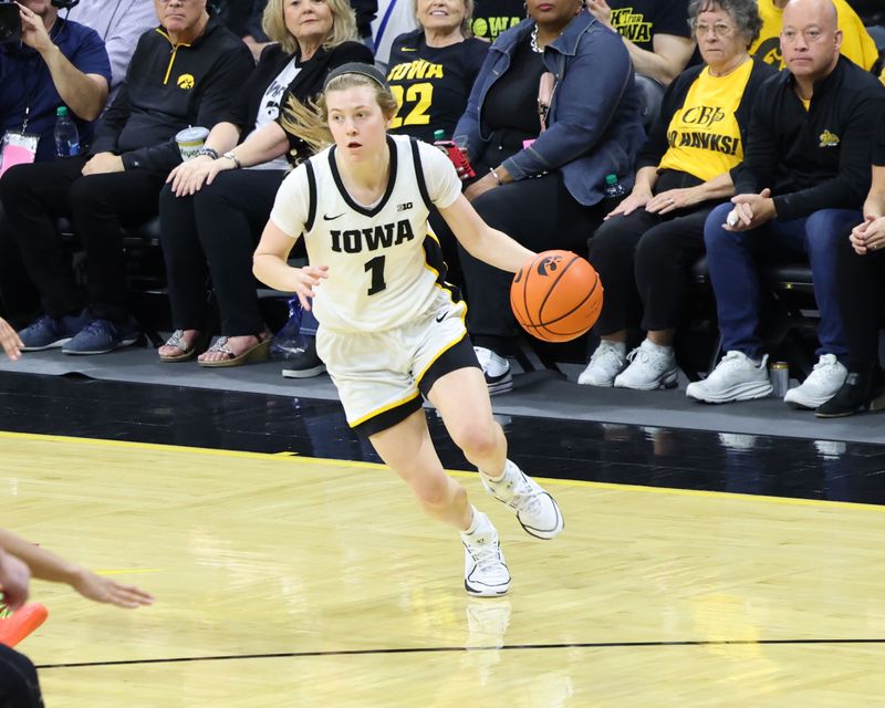 Mar 3, 2024; Iowa City, Iowa, USA; Iowa Hawkeyes guard Molly Davis (1) sets the offense against the Ohio State Buckeyes during the first half at Carver-Hawkeye Arena. Mandatory Credit: Reese Strickland-USA TODAY Sports