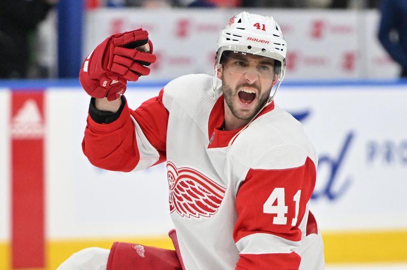 Jan 14, 2024; Toronto, Ontario, CAN;  Detroit Red Wings defenseman Shayne Gostisbehere (41) speaks to a teammate in warm up before playing the Toronto Maple Leafs at Scotiabank Arena. Mandatory Credit: Dan Hamilton-USA TODAY Sports