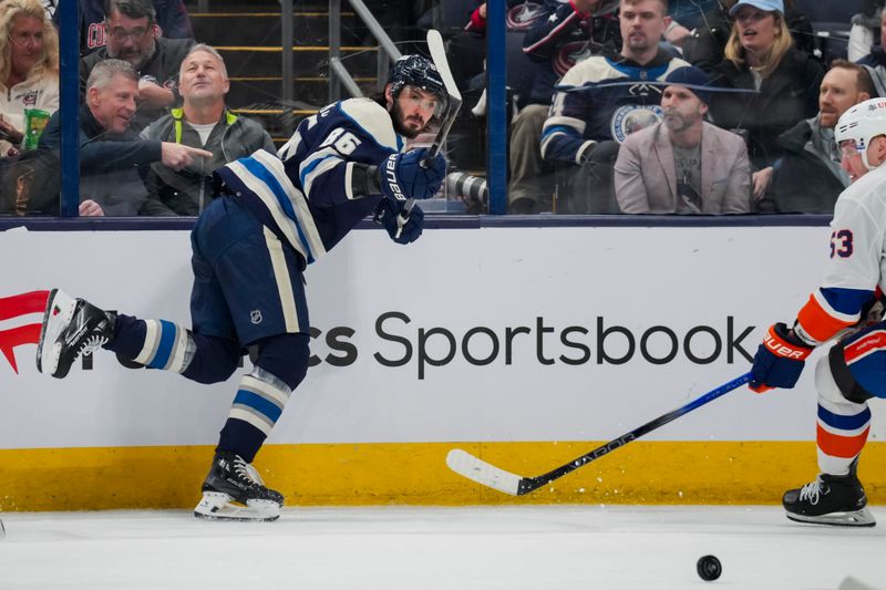 Apr 4, 2024; Columbus, Ohio, USA;  Columbus Blue Jackets right wing Kirill Marchenko (86) passes the puck against the New York Islanders in the second period at Nationwide Arena. Mandatory Credit: Aaron Doster-USA TODAY Sports