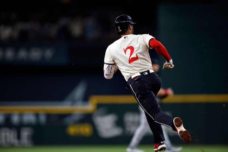 Sep 2, 2023; Arlington, Texas, USA; Texas Rangers second baseman Marcus Semien (2) runs to second base with a double in the first inning against the Minnesota Twins at Globe Life Field. Mandatory Credit: Tim Heitman-USA TODAY Sports