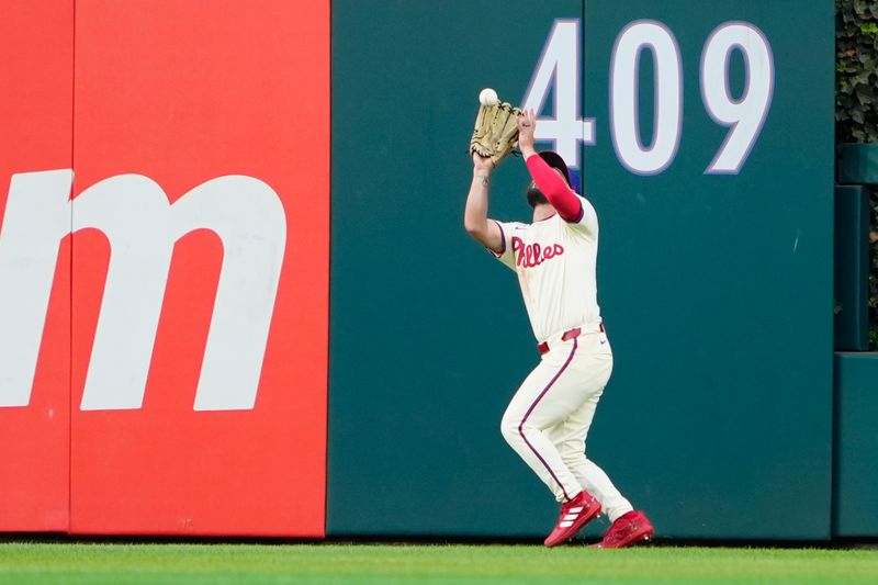 Sep 14, 2024; Philadelphia, Pennsylvania, USA; Philadelphia Phillies center fielder Cal Stevenson (47) catches a fly ball hit by New York Nets right fielder Jessie Winker (not pictured) during the eighth inning at Citizens Bank Park. Mandatory Credit: Gregory Fisher-Imagn Images