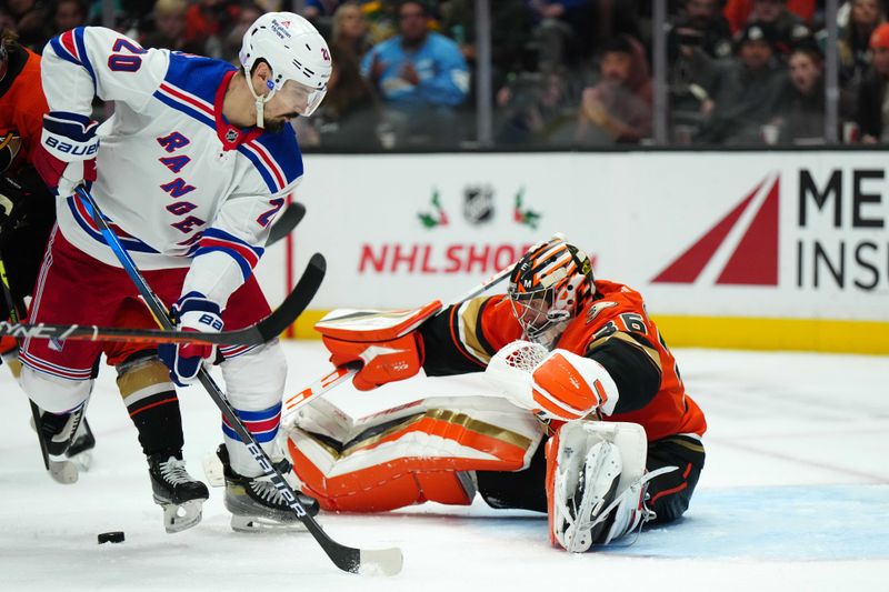 Nov 23, 2022; Anaheim, California, USA; Anaheim Ducks goaltender John Gibson (36) defends the goal against New York Rangers left wing Chris Kreider (20) in the third period at Honda Center. Mandatory Credit: Kirby Lee-USA TODAY Sports