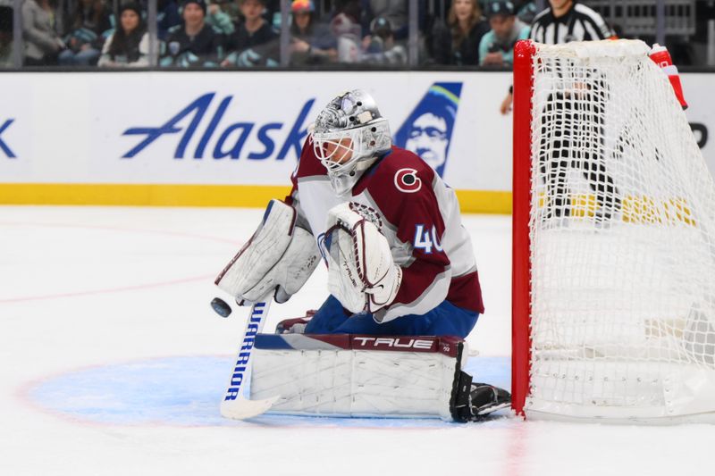 Nov 13, 2023; Seattle, Washington, USA; Colorado Avalanche goaltender Alexandar Georgiev (40) blocks a shot against the Seattle Kraken during the second period at Climate Pledge Arena. Mandatory Credit: Steven Bisig-USA TODAY Sports