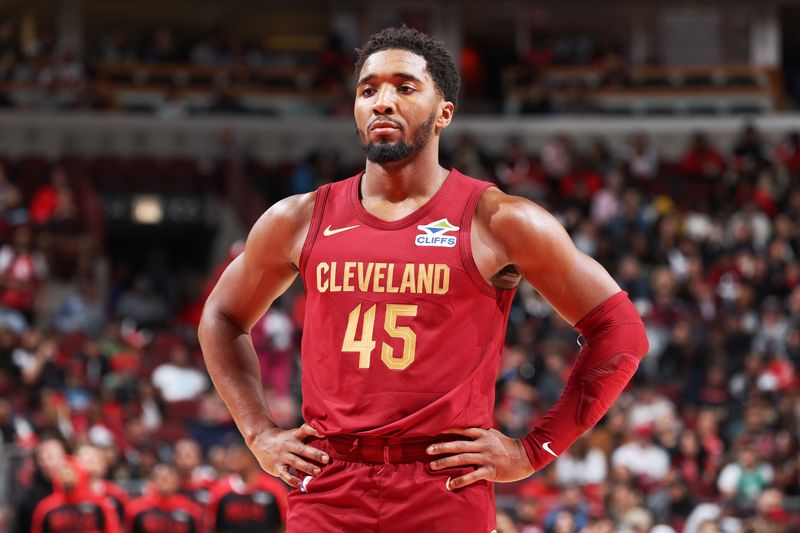 CHICAGO, IL - OCTOBER 18: Donovan Mitchell #45 of the Cleveland Cavaliers looks on during the game against the Chicago Bulls on October 18, 2024 at United Center in Chicago, Illinois. NOTE TO USER: User expressly acknowledges and agrees that, by downloading and or using this photograph, User is consenting to the terms and conditions of the Getty Images License Agreement. Mandatory Copyright Notice: Copyright 2023 NBAE (Photo by Jeff Haynes/NBAE via Getty Images)