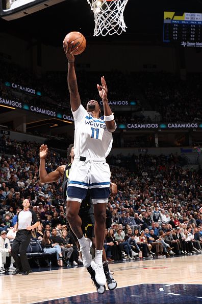 MINNEAPOLIS, MN - NOVEMBER 30: Naz Reid #11 of the Minnesota Timberwolves drives to the basket during the game against the Utah Jazz on November 30, 2023 at Target Center in Minneapolis, Minnesota. NOTE TO USER: User expressly acknowledges and agrees that, by downloading and or using this Photograph, user is consenting to the terms and conditions of the Getty Images License Agreement. Mandatory Copyright Notice: Copyright 2023 NBAE (Photo by David Sherman/NBAE via Getty Images)