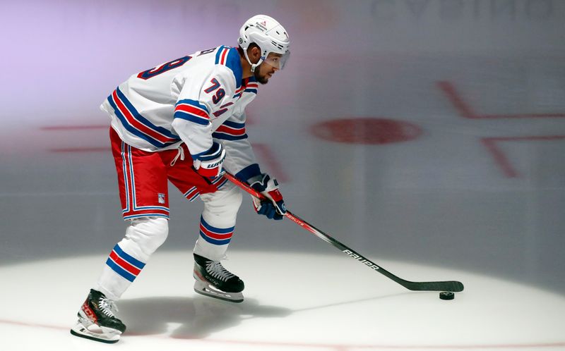 Mar 16, 2024; Pittsburgh, Pennsylvania, USA; New York Rangers defenseman K'Andre Miller (79) takes the ice to warm up before the game against the Pittsburgh Penguins at PPG Paints Arena. Mandatory Credit: Charles LeClaire-USA TODAY Sports