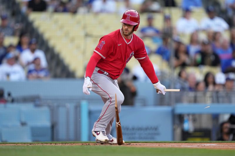 Apr 5, 2022; Los Angeles, California, USA; Los Angeles Angels right fielder Taylor Ward (3) breaks his bat in the first inning against the Los Angeles Dodgers at Dodger Stadium. Mandatory Credit: Kirby Lee-USA TODAY Sports