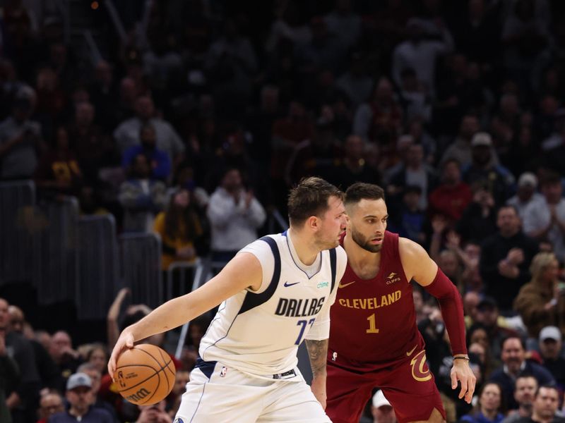 CLEVELAND, OH - FEBRUARY 27: Luka Doncic #77 of the Dallas Mavericks handles the ball during the game against the Cleveland Cavaliers on February 27, 2024 at Rocket Mortgage FieldHouse in Cleveland, Ohio. NOTE TO USER: User expressly acknowledges and agrees that, by downloading and/or using this Photograph, user is consenting to the terms and conditions of the Getty Images License Agreement. Mandatory Copyright Notice: Copyright 2024 NBAE (Photo by  Lauren Leigh Bacho/NBAE via Getty Images)