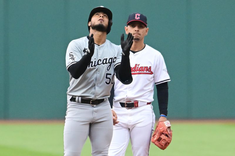 Apr 9, 2024; Cleveland, Ohio, USA; Chicago White Sox second baseman Lenyn Sosa (50) celebrates after hitting an RBI double during the first inning against the Cleveland Guardians at Progressive Field. Mandatory Credit: Ken Blaze-USA TODAY Sports