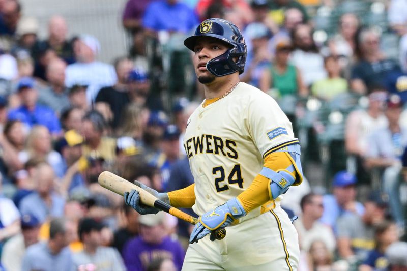 Jul 11, 2024; Milwaukee, Wisconsin, USA;  Milwaukee Brewers catcher William Contreras (24) reacts after striking out in the eighth inning against the Pittsburgh Pirates at American Family Field. Mandatory Credit: Benny Sieu-USA TODAY Sports