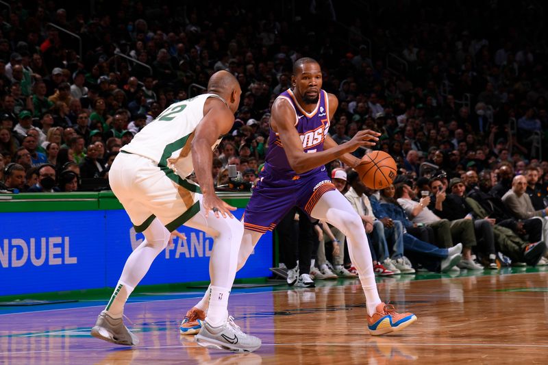 BOSTON, MA - MARCH 14: Kevin Durant #35 of the Phoenix Suns dribbles the ball during the game against the Boston Celtics on March 14, 2024 at the TD Garden in Boston, Massachusetts. NOTE TO USER: User expressly acknowledges and agrees that, by downloading and or using this photograph, User is consenting to the terms and conditions of the Getty Images License Agreement. Mandatory Copyright Notice: Copyright 2024 NBAE  (Photo by Brian Babineau/NBAE via Getty Images)