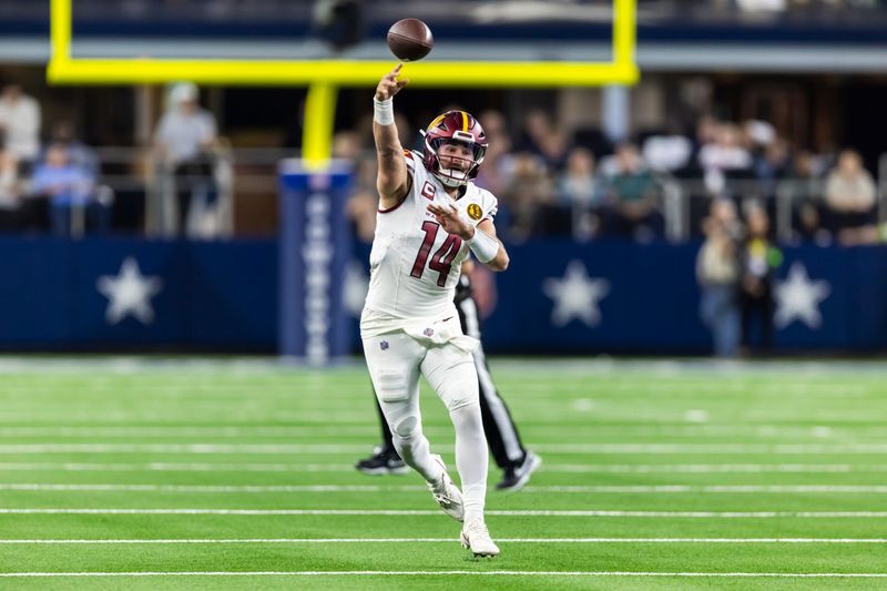 Washington Commanders quarterback Sam Howell (14) throws during an NFL football game against the Dallas Cowboys, Thursday, Nov. 23, 2023, in Arlington, Texas. Dallas won 45-10. (AP Photo/Brandon Wade)