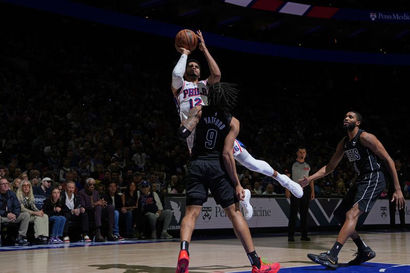 PHILADELPHIA, PA - APRIL 14: Tobias Harris #12 of the Philadelphia 76ers shoots the ball during the game against the Brooklyn Nets on April 14, 2024 at the Wells Fargo Center in Philadelphia, Pennsylvania NOTE TO USER: User expressly acknowledges and agrees that, by downloading and/or using this Photograph, user is consenting to the terms and conditions of the Getty Images License Agreement. Mandatory Copyright Notice: Copyright 2024 NBAE (Photo by Jesse D. Garrabrant/NBAE via Getty Images)