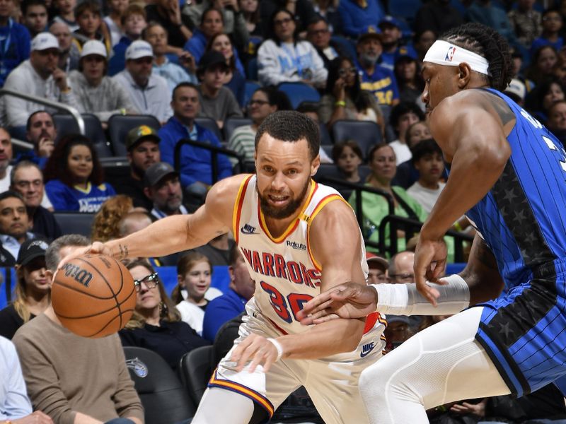 ORLANDO, FL - FEBRUARY 27:  Stephen Curry #30 of the Golden State Warriors dribbles the ball during the game against the Orlando Magic on February 27, 2025 at Kia Center in Orlando, Florida. NOTE TO USER: User expressly acknowledges and agrees that, by downloading and or using this photograph, User is consenting to the terms and conditions of the Getty Images License Agreement. Mandatory Copyright Notice: Copyright 2025 NBAE (Photo by Fernando Medina/NBAE via Getty Images)