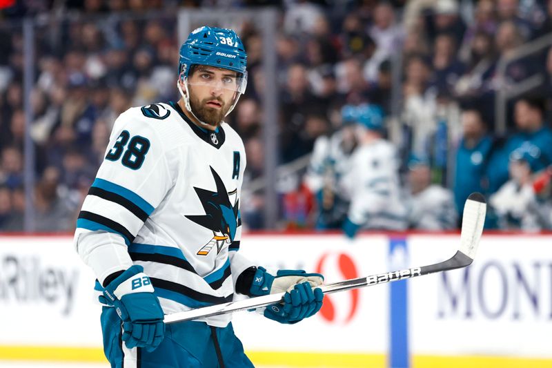 Feb 14, 2024; Winnipeg, Manitoba, CAN; San Jose Sharks defenseman Mario Ferraro (38) looks on during a time out in the first period against the Winnipeg Jets at Canada Life Centre. Mandatory Credit: James Carey Lauder-USA TODAY Sports