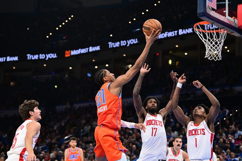 OKLAHOMA CITY, OKLAHOMA - NOVEMBER 8: Aaron Wiggins #21 of the Oklahoma City Thunder puts up a shot during the second half against the Houston Rockets at Paycom Center on November 8, 2024 in Oklahoma City, Oklahoma. NOTE TO USER: User expressly acknowledges and agrees that, by downloading and or using this photograph, User is consenting to the terms and conditions of the Getty Images License Agreement. (Photo by Joshua Gateley/Getty Images)