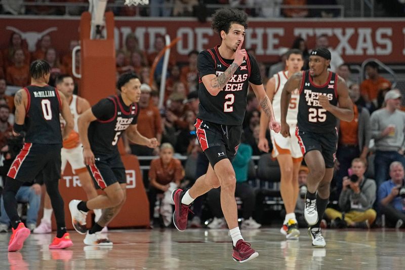 Jan 6, 2024; Austin, Texas, USA; Texas Tech Red Raiders guard Pop Isaacs (2) reacts after scoring a three point basket during the first half against the Texas Longhorns at Moody Center. Mandatory Credit: Scott Wachter-USA TODAY Sports