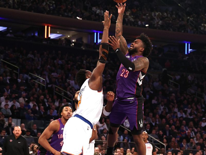 NEW YORK, NEW YORK - JANUARY 08:  Jamal Shead #23 of the Toronto Raptors shoots against OG Anunoby #8 of the New York Knicks during their game at Madison Square Garden on January 08, 2025 in New York City.   User expressly acknowledges and agrees that, by downloading and or using this photograph, User is consenting to the terms and conditions of the Getty Images License Agreement.  (Photo by Al Bello/Getty Images)