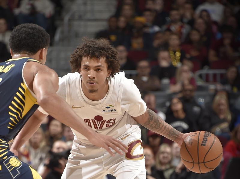 CLEVELAND, OH - APRIL 13:  Craig Porter Jr. #9 of the Cleveland Cavaliers dribbles the ball during the game against the Indiana Pacers on April 13, 2025 at Rocket Arena in Cleveland, Ohio. NOTE TO USER: User expressly acknowledges and agrees that, by downloading and/or using this Photograph, user is consenting to the terms and conditions of the Getty Images License Agreement. Mandatory Copyright Notice: Copyright 2025 NBAE (Photo by David Liam Kyle/NBAE via Getty Images)