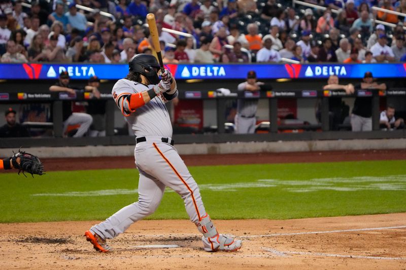 Jul 2, 2023; New York City, New York, USA; San Francisco Giants shortstop Brandon Crawford (35) hits a single against the New York Mets during the fourth inning at Citi Field. Mandatory Credit: Gregory Fisher-USA TODAY Sports