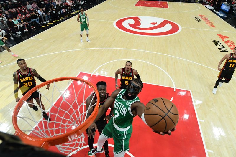 ATLANTA, GA - APRIL 23: Jaylen Brown #7 of the Boston Celtics shoots the ball during Round One Game Four of the 2023 NBA Playoffs on April 23, 2023 at State Farm Arena in Atlanta, Georgia.  NOTE TO USER: User expressly acknowledges and agrees that, by downloading and/or using this Photograph, user is consenting to the terms and conditions of the Getty Images License Agreement. Mandatory Copyright Notice: Copyright 2023 NBAE (Photo by Adam Hagy/NBAE via Getty Images)