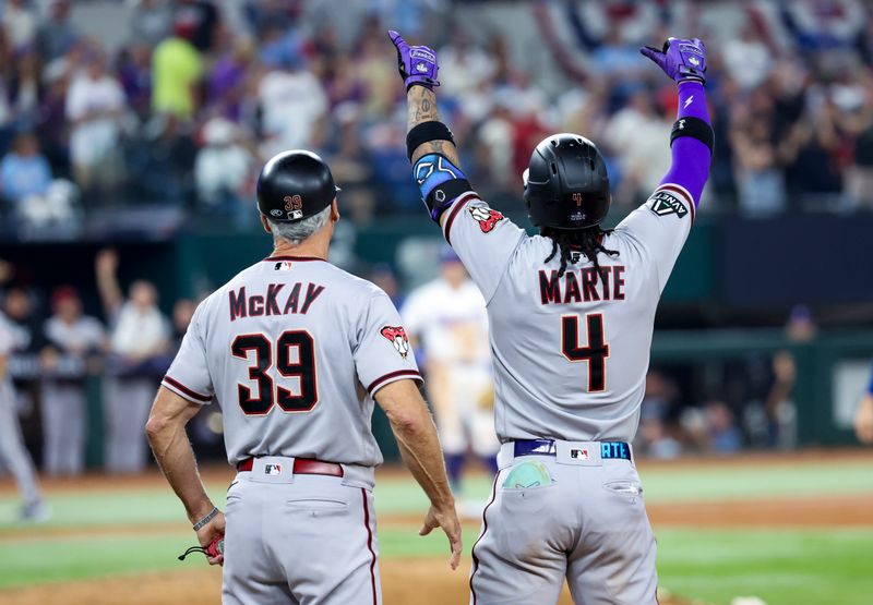 Oct 28, 2023; Arlington, TX, USA;  Arizona Diamondbacks second baseman Ketel Marte (4) celebrates after hitting a two-run single during the eighth inning against the Texas Rangers in game two of the 2023 World Series at Globe Life Field. Mandatory Credit: Kevin Jairaj-USA TODAY Sports