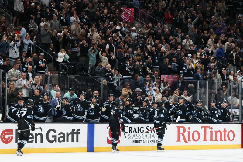Dec 12, 2025; Salt Lake City, Utah, USA;  The Utah Mammoth celebrate a goal by center Nick Schmaltz (8) during the second period of the game against the Seattle Kraken at Delta Center. Mandatory Credit: Rob Gray-Imagn Images