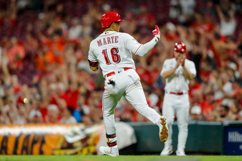 Sep 5, 2023; Cincinnati, Ohio, USA; Cincinnati Reds third baseman Noelvi Marte (16) reacts after hitting a solo home run in the sixth inning against the Seattle Mariners at Great American Ball Park. Mandatory Credit: Katie Stratman-USA TODAY Sports