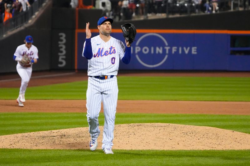 Jul 2, 2023; New York City, New York, USA; New York Mets pitcher Adam Ottavino (0) reacts to getting the third out during the eighth inning against the San Francisco Giants at Citi Field. Mandatory Credit: Gregory Fisher-USA TODAY Sports