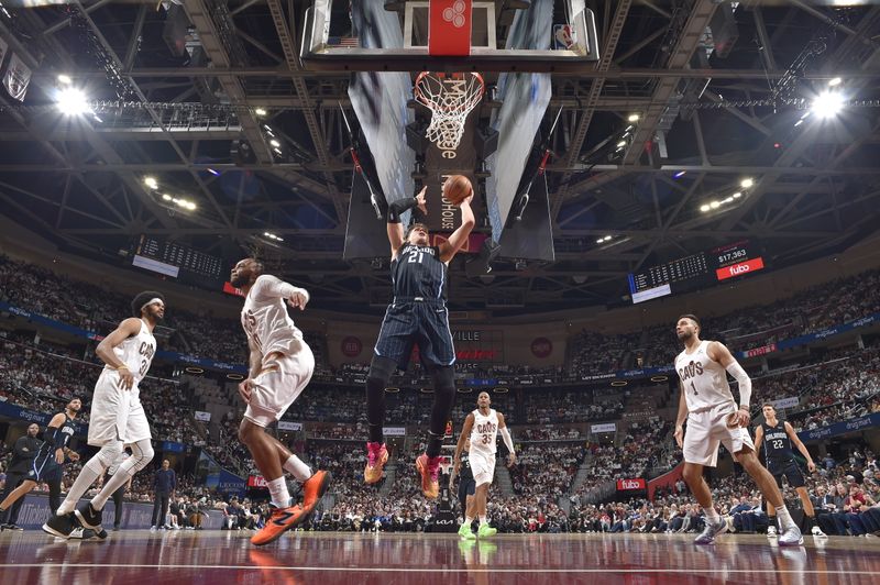 CLEVELAND, OH - APRIL 22: Moritz Wagner #21 of the Orlando Magic shoots the ball during the game against the Cleveland Cavaliers during Round 1 Game 2 of the 2024 NBA Playoffs on April 22, 2024 at Rocket Mortgage FieldHouse in Cleveland, Ohio. NOTE TO USER: User expressly acknowledges and agrees that, by downloading and/or using this Photograph, user is consenting to the terms and conditions of the Getty Images License Agreement. Mandatory Copyright Notice: Copyright 2024 NBAE (Photo by David Liam Kyle/NBAE via Getty Images)