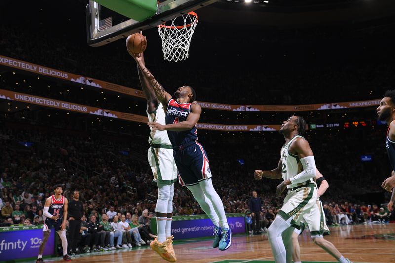 BOSTON, MA - APRIL 14: Jared Butler #4 of the Washington Wizards drives to the basket during the game  against the Boston Celtics on April 14, 2024 at the TD Garden in Boston, Massachusetts. NOTE TO USER: User expressly acknowledges and agrees that, by downloading and or using this photograph, User is consenting to the terms and conditions of the Getty Images License Agreement. Mandatory Copyright Notice: Copyright 2024 NBAE  (Photo by Brian Babineau/NBAE via Getty Images)