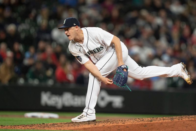 Apr 21, 2023; Seattle, Washington, USA; Seattle Mariners reliever Paul Sewald (37) delivers a pitch during the ninth inning against the St. Louis Cardinals at T-Mobile Park. Mandatory Credit: Stephen Brashear-USA TODAY Sports