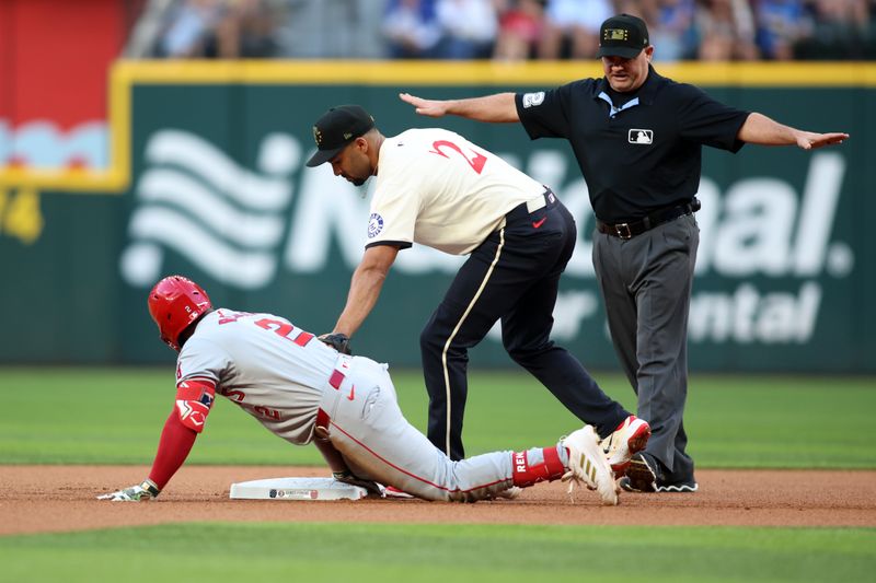 May 17, 2024; Arlington, Texas, USA; Los Angeles Angels third base Luis Rengifo (2) is safe at second base as Texas Rangers second base Marcus Semien (2) applies the tag in the first inning at Globe Life Field. Mandatory Credit: Tim Heitman-USA TODAY Sports