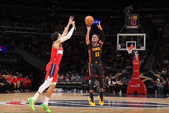 WASHINGTON, DC -? DECEMBER 31: Trae Young #11 of the Atlanta Hawks shoots the ball during the game against the Washington Wizards on December 31, 2023 at Capital One Arena in Washington, DC. NOTE TO USER: User expressly acknowledges and agrees that, by downloading and or using this Photograph, user is consenting to the terms and conditions of the Getty Images License Agreement. Mandatory Copyright Notice: Copyright 2023 NBAE (Photo by Stephen Gosling/NBAE via Getty Images)