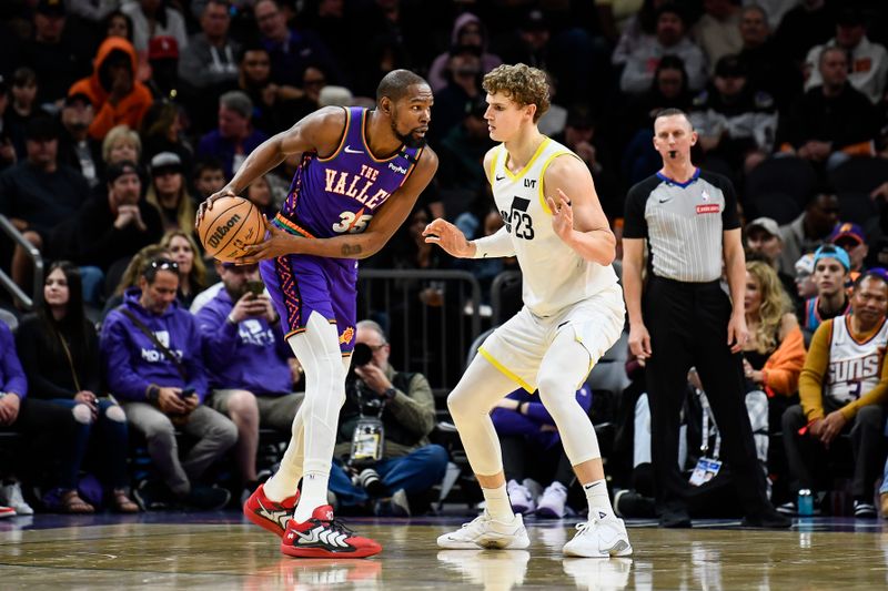 PHOENIX, ARIZONA - JANUARY 11: Kevin Durant #35 of the Phoenix Suns controls the ball against Lauri Markkanen #23 of the Utah Jazz during the second half of the NBA game at Footprint Center on January 11, 2025 in Phoenix, Arizona. NOTE TO USER: User expressly acknowledges and agrees that, by downloading and or using this photograph, User is consenting to the terms and conditions of the Getty Images License Agreement. (Photo by Kelsey Grant/Getty Images)