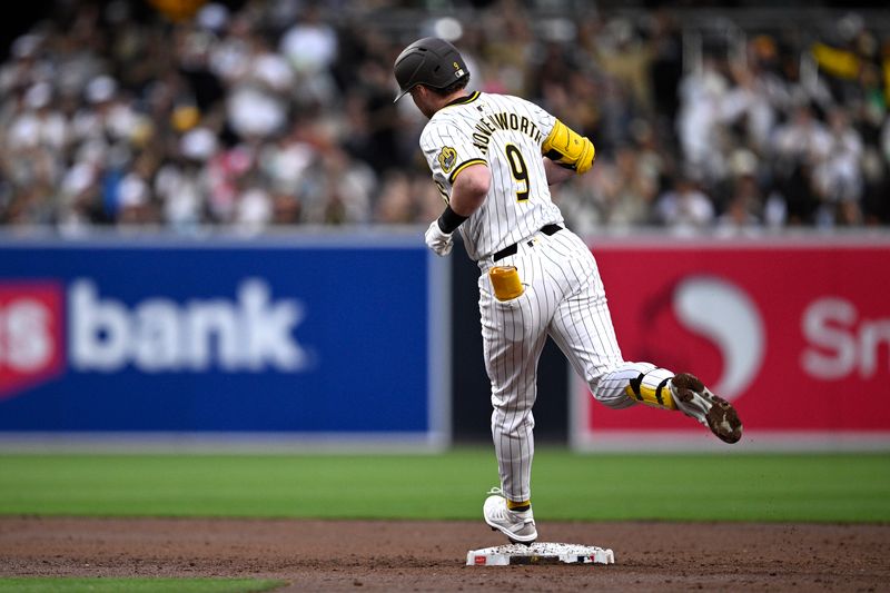 Jun 10, 2024; San Diego, California, USA; San Diego Padres second baseman Jake Cronenworth (9) rounds the bases after hitting a home run against the Oakland Athletics during the third inning at Petco Park. Mandatory Credit: Orlando Ramirez-USA TODAY Sports