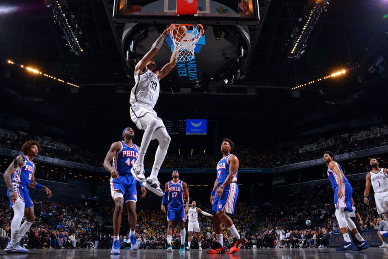 BROOKLYN, NY - MARCH 5: Nicolas Claxton #33 of the Brooklyn Nets dunks the ball during the game against the Philadelphia 76ers on March 5, 2024 at Barclays Center in Brooklyn, New York. NOTE TO USER: User expressly acknowledges and agrees that, by downloading and or using this Photograph, user is consenting to the terms and conditions of the Getty Images License Agreement. Mandatory Copyright Notice: Copyright 2024 NBAE (Photo by Jesse D. Garrabrant/NBAE via Getty Images)