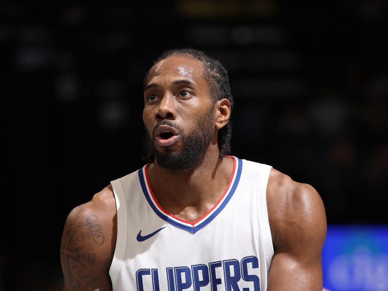 MEMPHIS, TN - FEBRUARY 23: Kawhi Leonard #2 of the LA Clippers shoots a free throw during the game against the Memphis Grizzlies on February 23, 2024 at FedExForum in Memphis, Tennessee. NOTE TO USER: User expressly acknowledges and agrees that, by downloading and or using this photograph, User is consenting to the terms and conditions of the Getty Images License Agreement. Mandatory Copyright Notice: Copyright 2024 NBAE (Photo by Joe Murphy/NBAE via Getty Images)