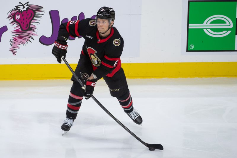 Feb 24, 2024; Ottawa, Ontario, CAN; Ottawa Senators defenseman Jakob Chychrun (6) controls the puck in the third period against the Vegas Golden Knights  at the Canadian Tire Centre. Mandatory Credit: Marc DesRosiers-USA TODAY Sports