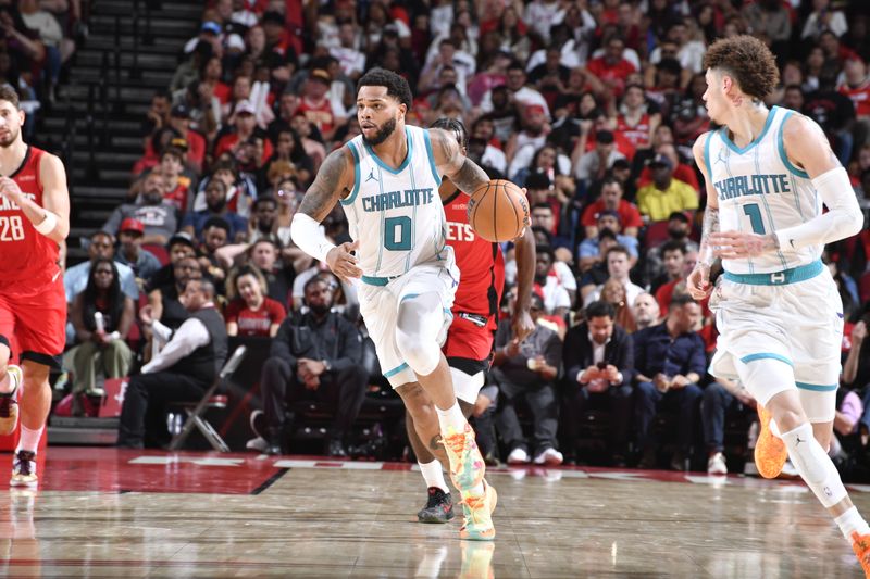 HOUSTON, TX - OCTOBER 23: Miles Bridges #0 of the Charlotte Hornets dribbles the ball during the game against the Houston Rockets  during a regular season game on October 23, 2024 at the Toyota Center in Houston, Texas. NOTE TO USER: User expressly acknowledges and agrees that, by downloading and or using this photograph, User is consenting to the terms and conditions of the Getty Images License Agreement. Mandatory Copyright Notice: Copyright 2024 NBAE (Photo by Logan Riely/NBAE via Getty Images)