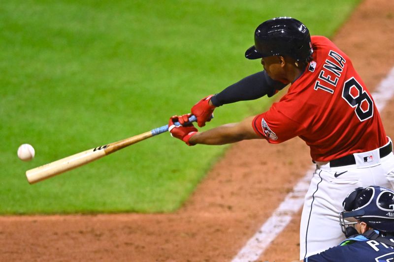 Sep 2, 2023; Cleveland, Ohio, USA; Cleveland Guardians shortstop Jose Tena (8) hits an RBI single against the Tampa Bay Rays in the eleventh inning at Progressive Field. Mandatory Credit: David Richard-USA TODAY Sports