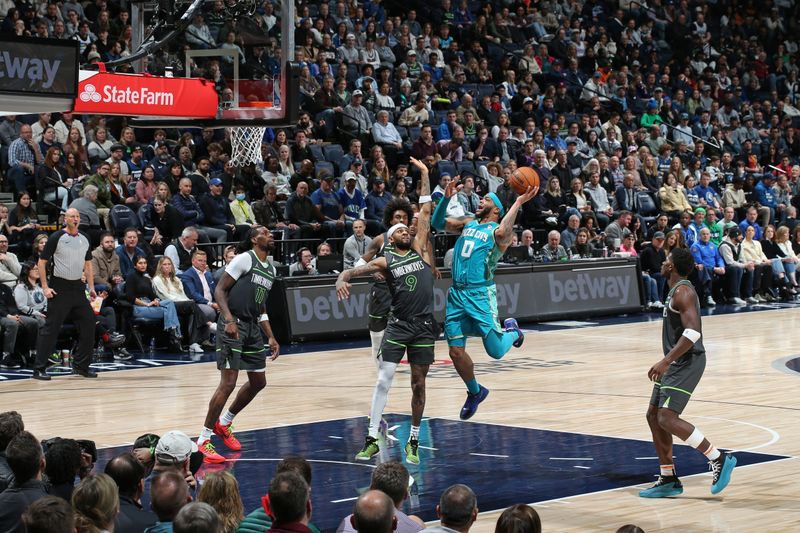 MINNEAPOLIS, MN -  JANUARY 22: Miles Bridges #0 of the Charlotte Hornets shoots the ball during the game against the Minnesota Timberwolves on January 22, 2024 at Target Center in Minneapolis, Minnesota. NOTE TO USER: User expressly acknowledges and agrees that, by downloading and or using this Photograph, user is consenting to the terms and conditions of the Getty Images License Agreement. Mandatory Copyright Notice: Copyright 2024 NBAE (Photo by David Sherman/NBAE via Getty Images)