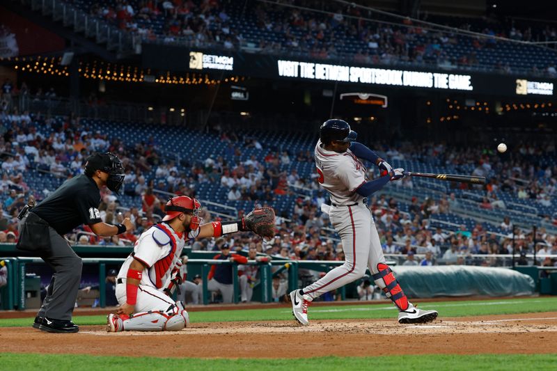 Sep 10, 2024; Washington, District of Columbia, USA; Atlanta Braves outfielder Jorge Soler (2) hits an RBI ground rule double against the Washington Nationals during the third inning at Nationals Park. Mandatory Credit: Geoff Burke-Imagn Images