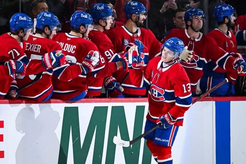 Mar 21, 2026; Montreal, Quebec, CAN; Montreal Canadiens right wing Cole Caufield (13) celebrates with his teammates at the bench his goal against the New York Islanders during the second period at Bell Centre. Mandatory Credit: David Kirouac-Imagn Images